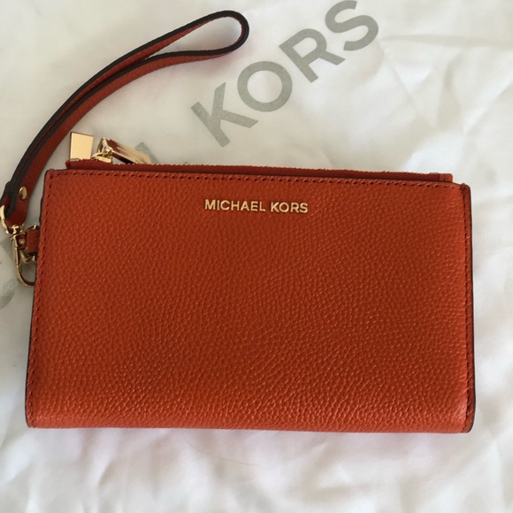 MICHAEL MICHAEL KORS
Adele Leather Smartphone Wallet Orange Never Carried - Picture 5 of 11